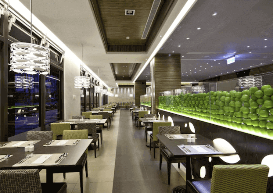 Elegant restaurant interior at Hualien hotel with contemporary design, offering a sophisticated dining experience for guests looking to enjoy local Taiwanese cuisine in a stylish setting